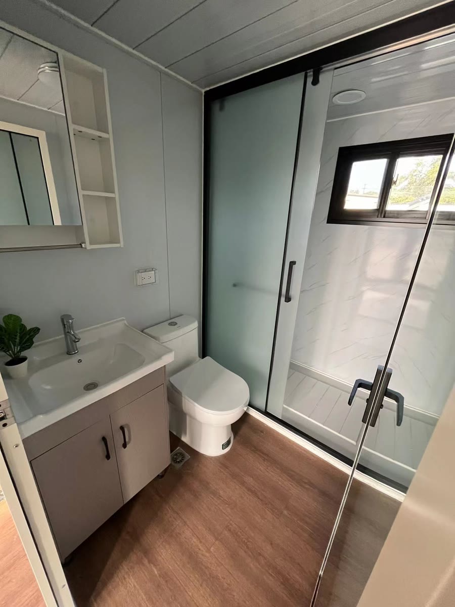Bathroom with shower and vanity
